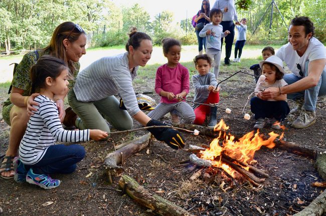 Fire in the woods with family