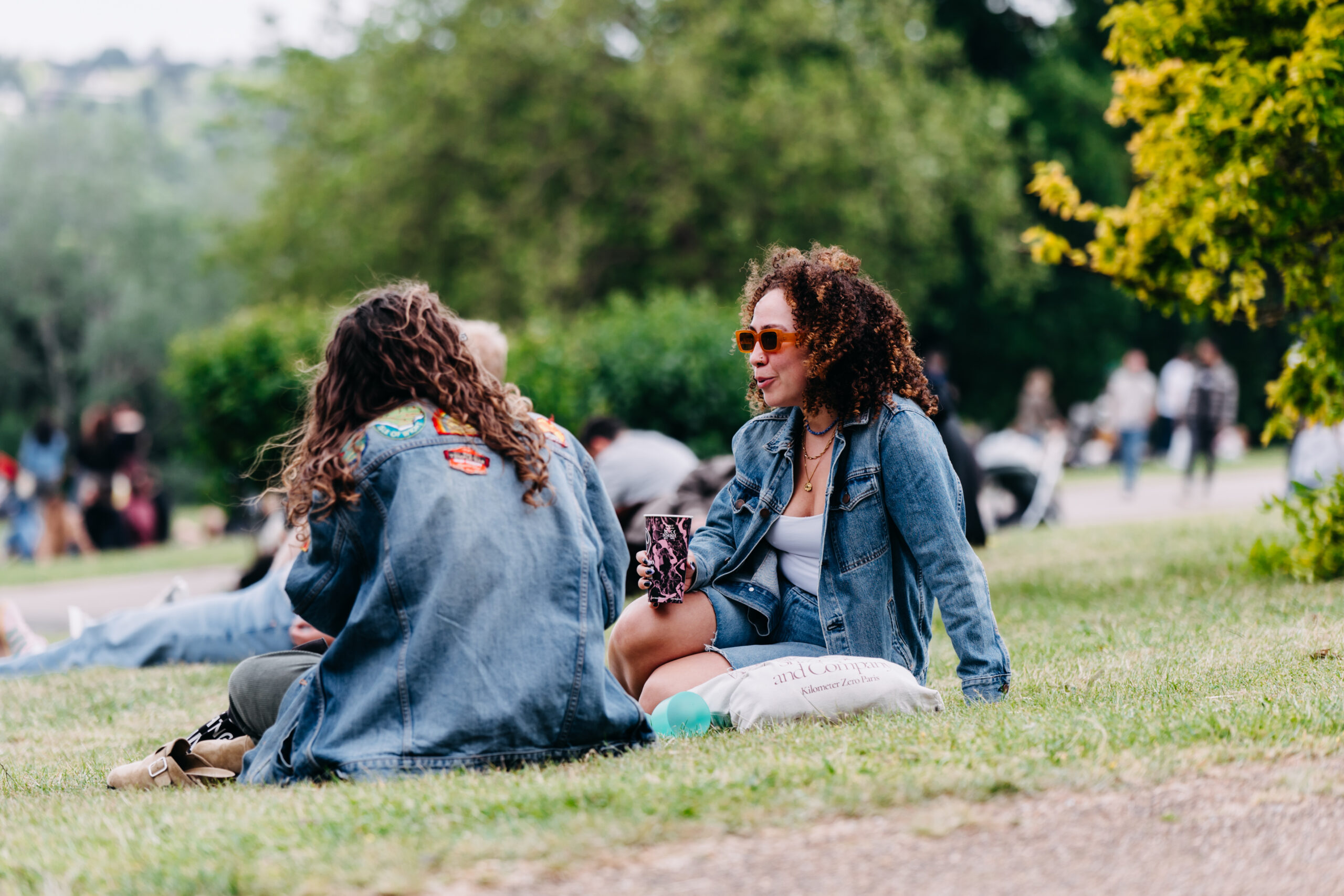 People sat in Alexandra Palace Park.